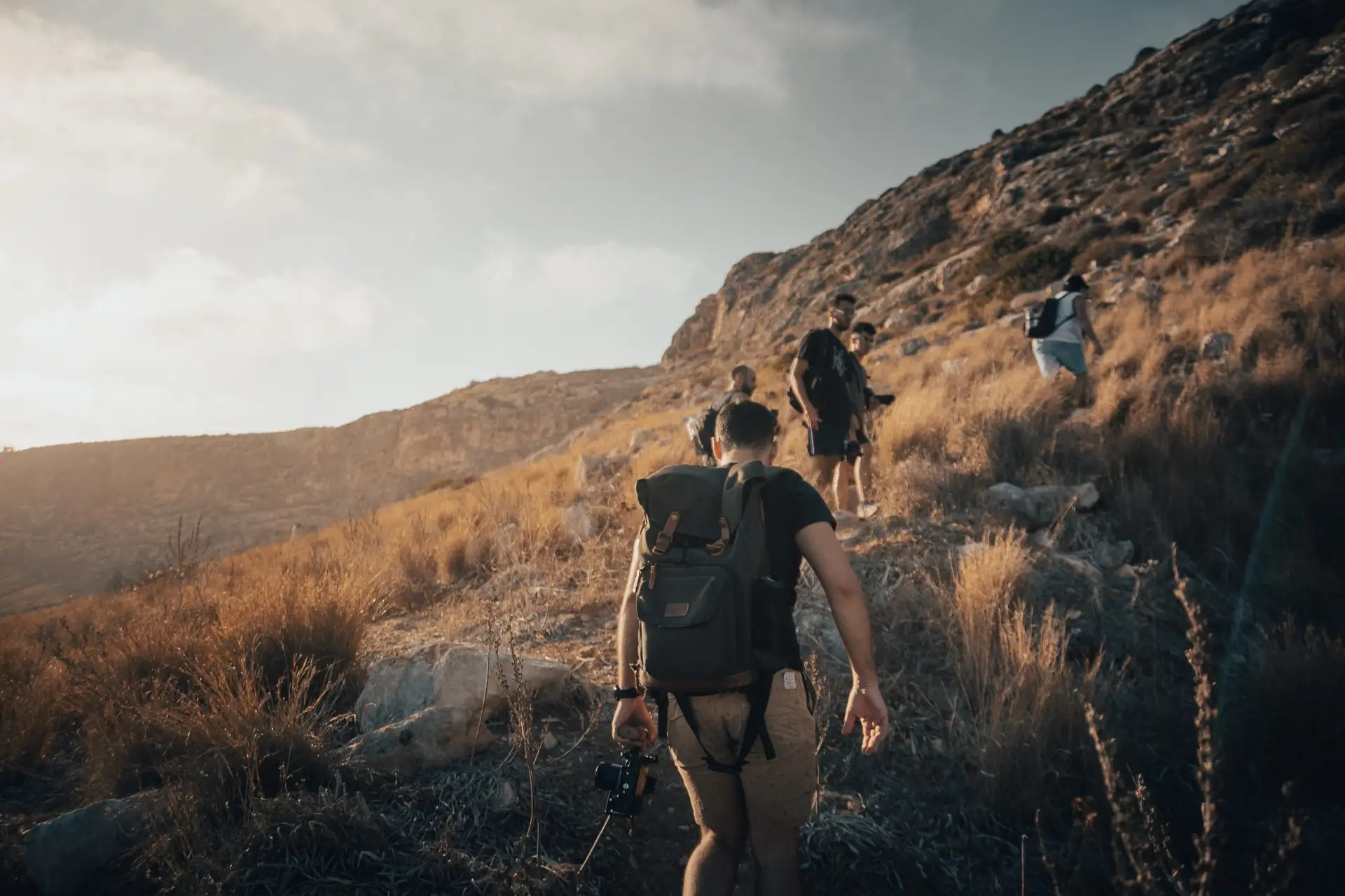 Image of group hiking up a mountain